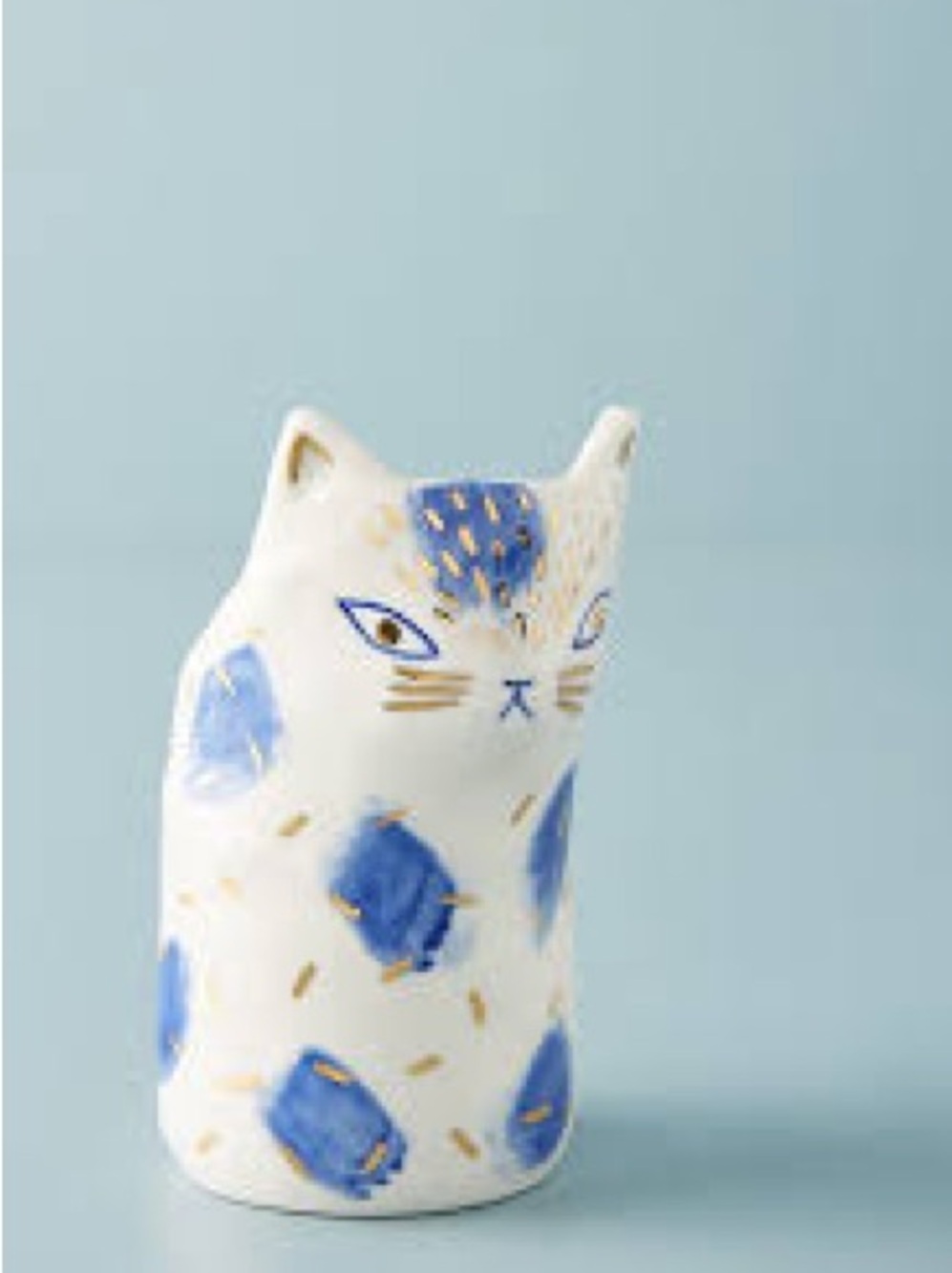Anthropologie BIRDCANFOX Cat Vase features hand-painted blue spots and gold
